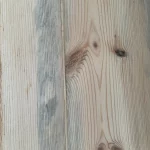 reen stains on old floorboards